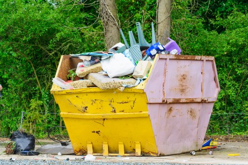 Frontline operatives handling commercial waste at a collection point