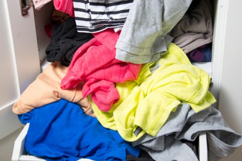 Team loading a man and van for shop clearance